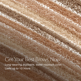 Estée Lauder Brow Now spoolie brushing blended color for natural finish