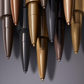 Estée Lauder BrowPerfect clear gel on spoolie taming hairs with long-lasting hold