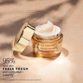 Estée Lauder cream application on hand demonstrating absorbent, non-greasy feel