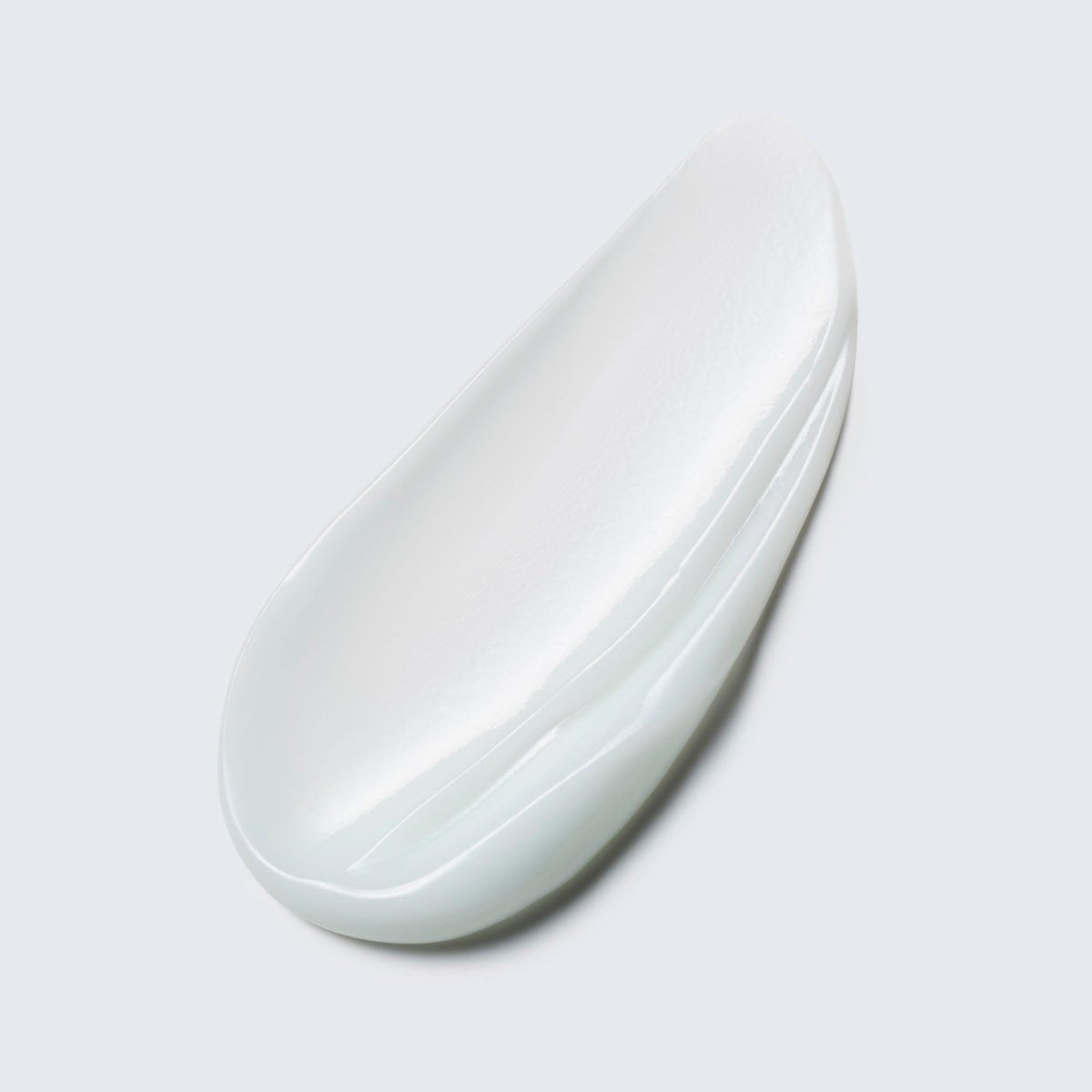Estée Lauder jar in hand to show 1.7 oz scale and easy daily use benefit