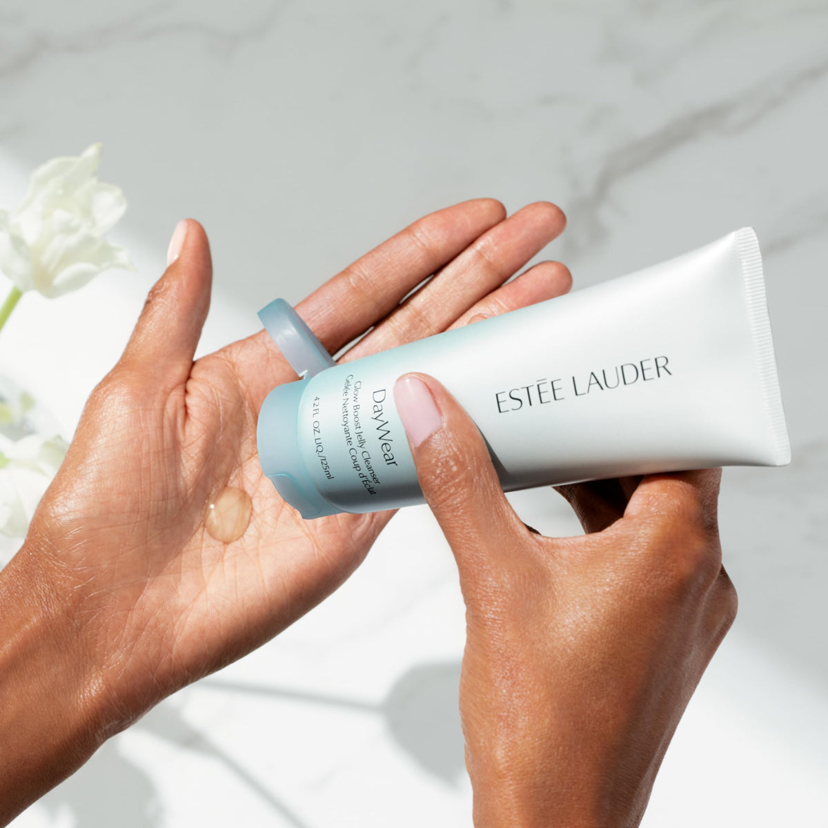 Estée Lauder pump dispensing cleanser illustrating easy, mess-free application