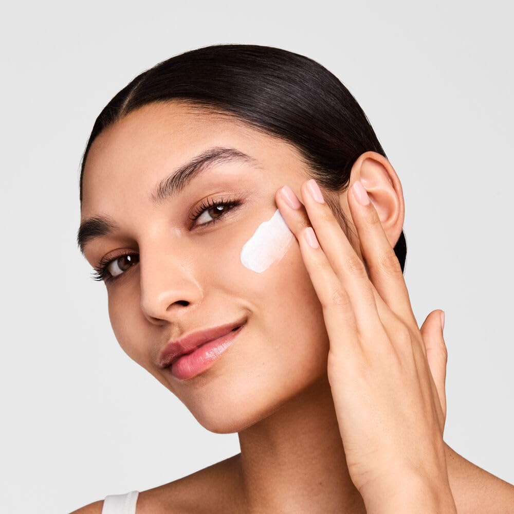 Estée Lauder cream being smoothed on skin demonstrating lightweight hydration and finish