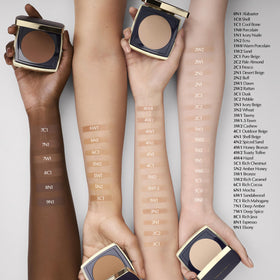 Estée Lauder open compact showing dual-sided applicator for customizable application
