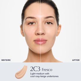 Estée Lauder foundation drop from pump emphasizing smooth, fluid texture