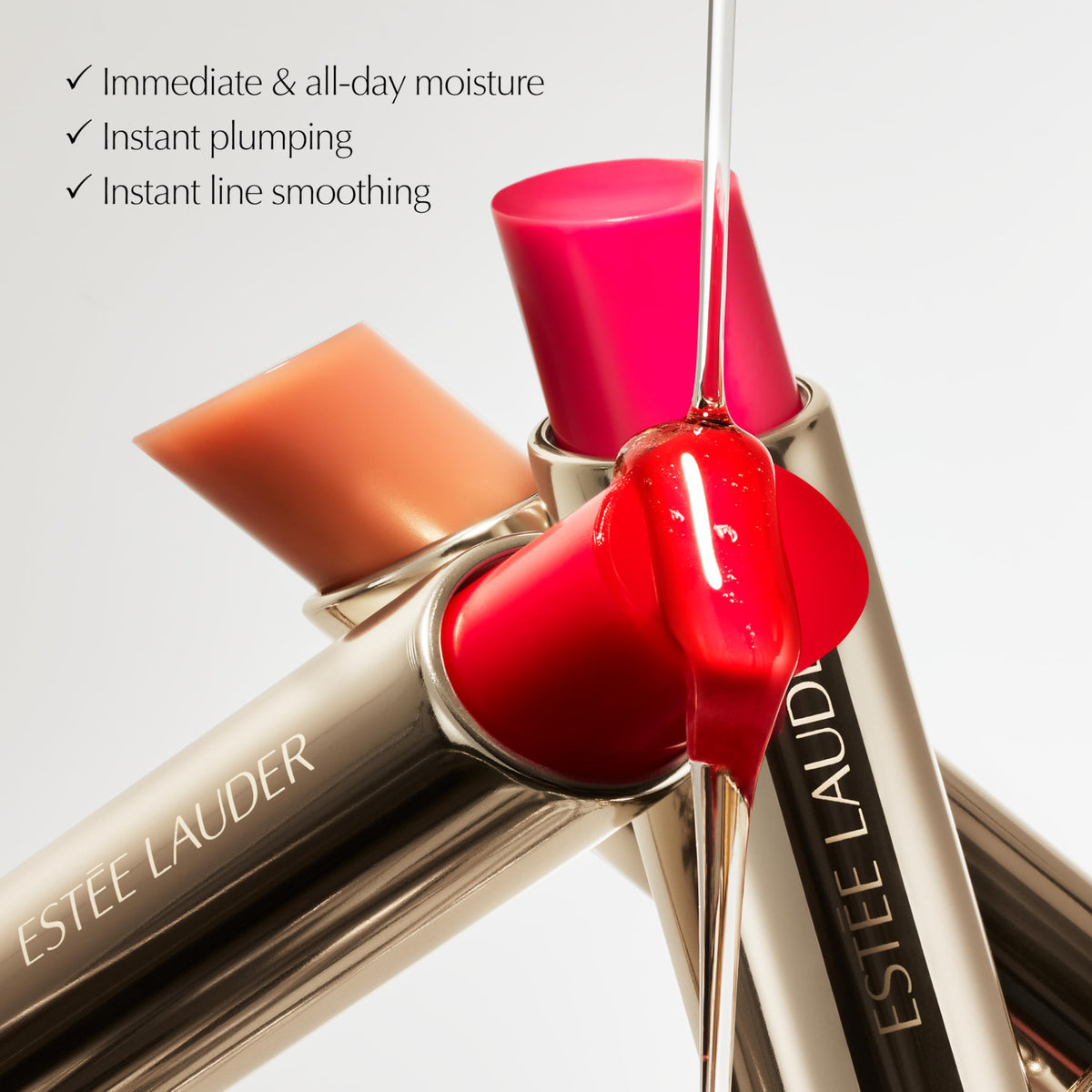 Estée Lauder Futurist HydraPlump next to coin for size and portability benefit