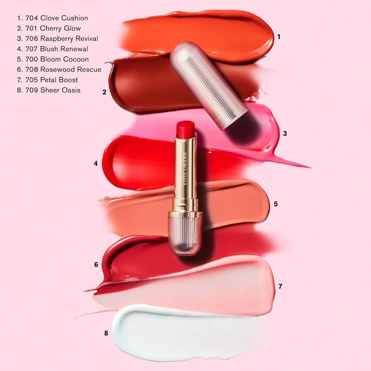 Estée Lauder balm next to a hand for scale showing compact travel-friendly size