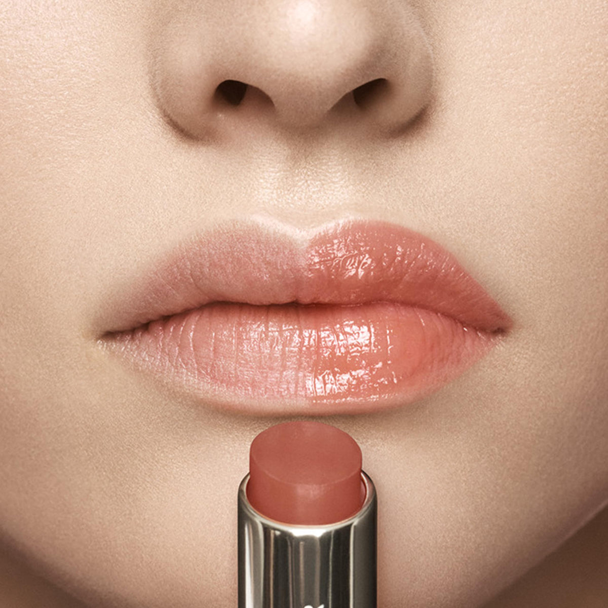 Estée Lauder twist-up stick revealing balm tip for convenient application