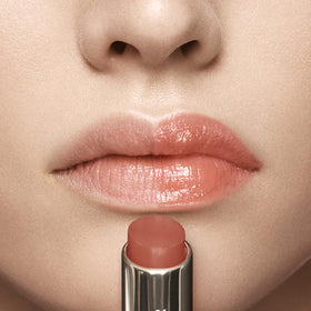 Estée Lauder twist-up stick revealing balm tip for convenient application
