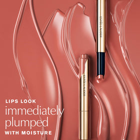 Estée Lauder glosstick texture close-up showing glossy reflective finish