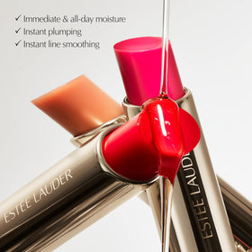 Estée Lauder fruit oils display with apricot cherry papaya highlighting nourishing oils