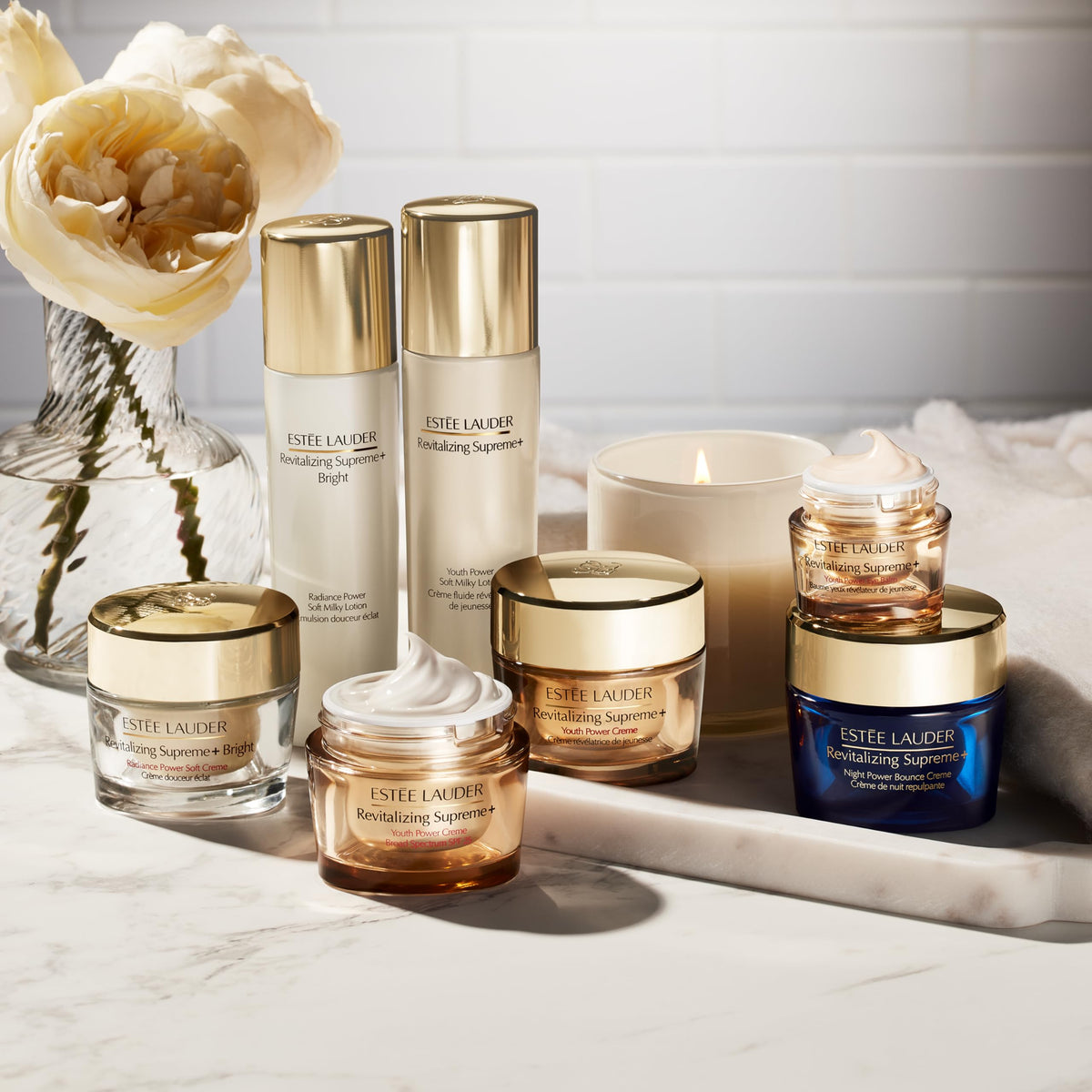 Estée Lauder jar open with visible label highlighting ingredients and recyclable glass