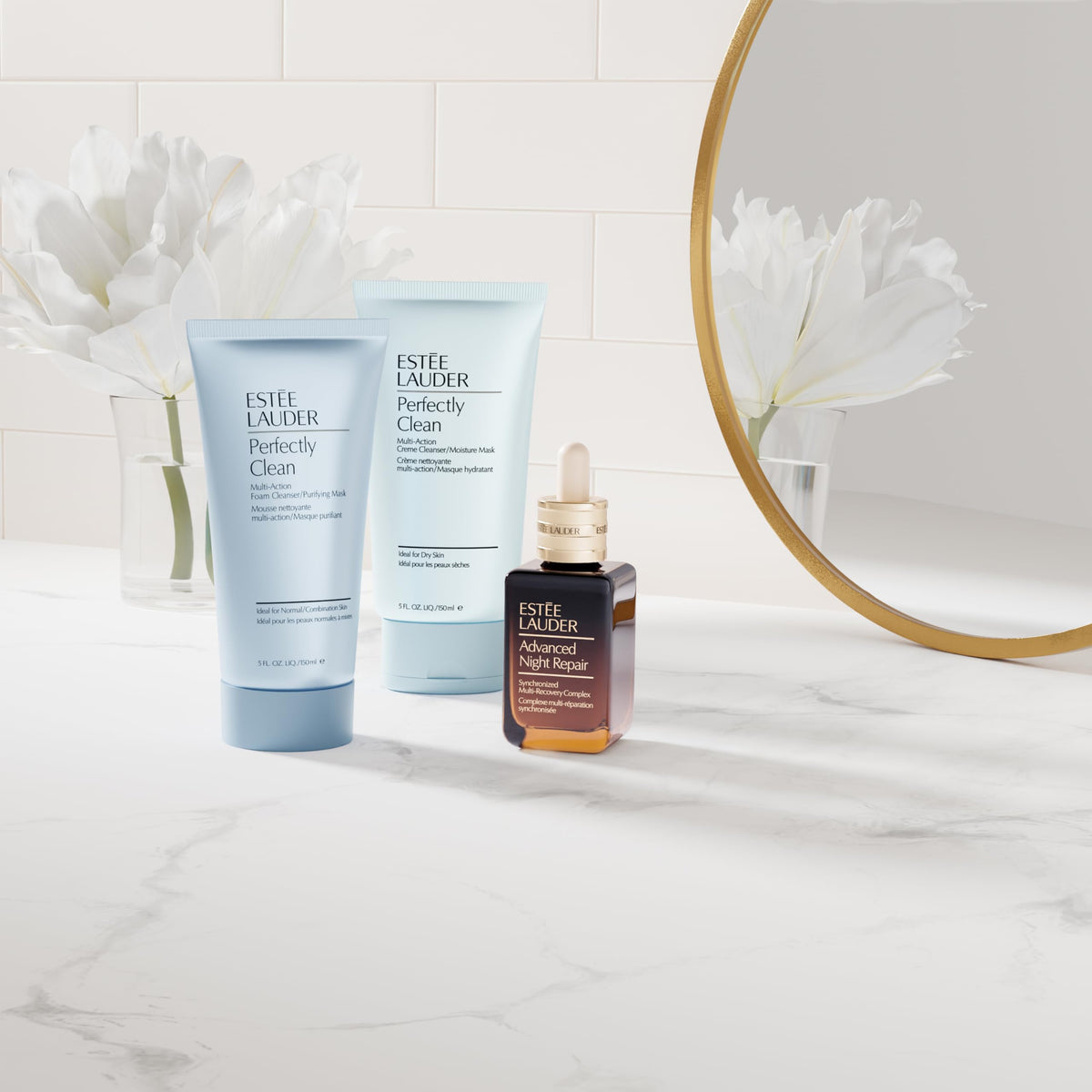 Estée Lauder bottle on bathroom shelf in lifestyle scene for daily routine inspiration benefit