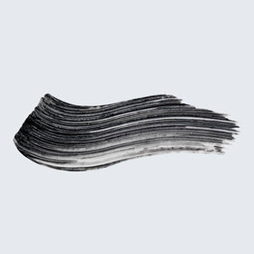 Estée Lauder little black primer application on lashes demonstrating visible black tint and lifted definition