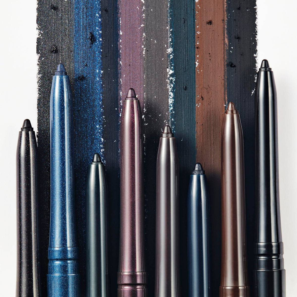 Estée Lauder pencil in use along upper lash line for defined eye look