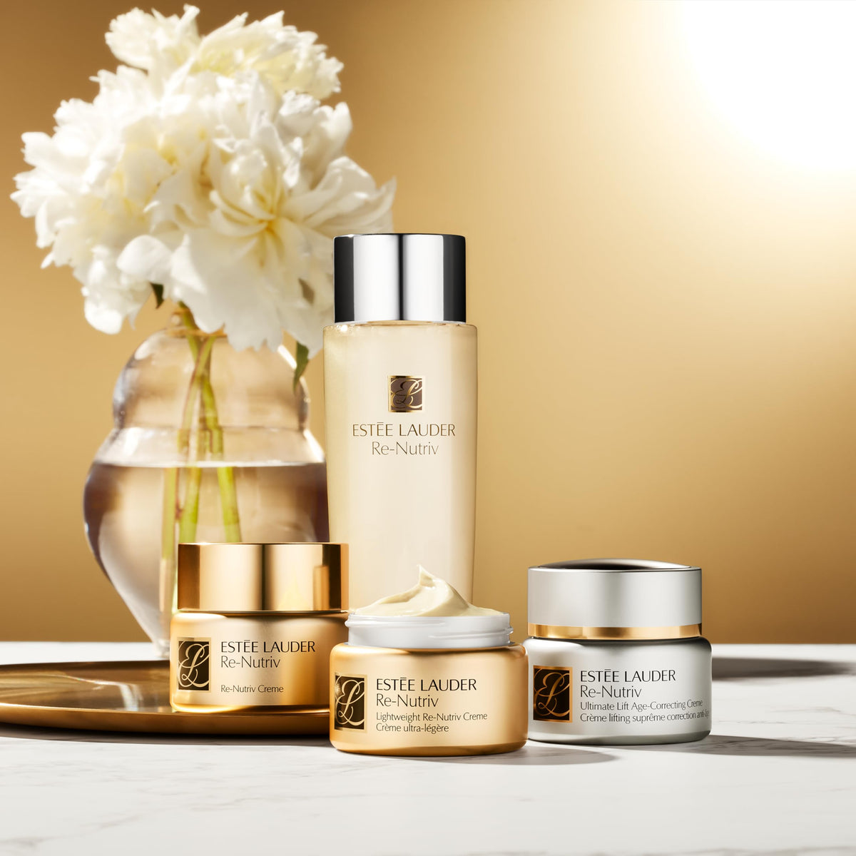 Estée Lauder applying cream to hand demonstrating lightweight nourishment