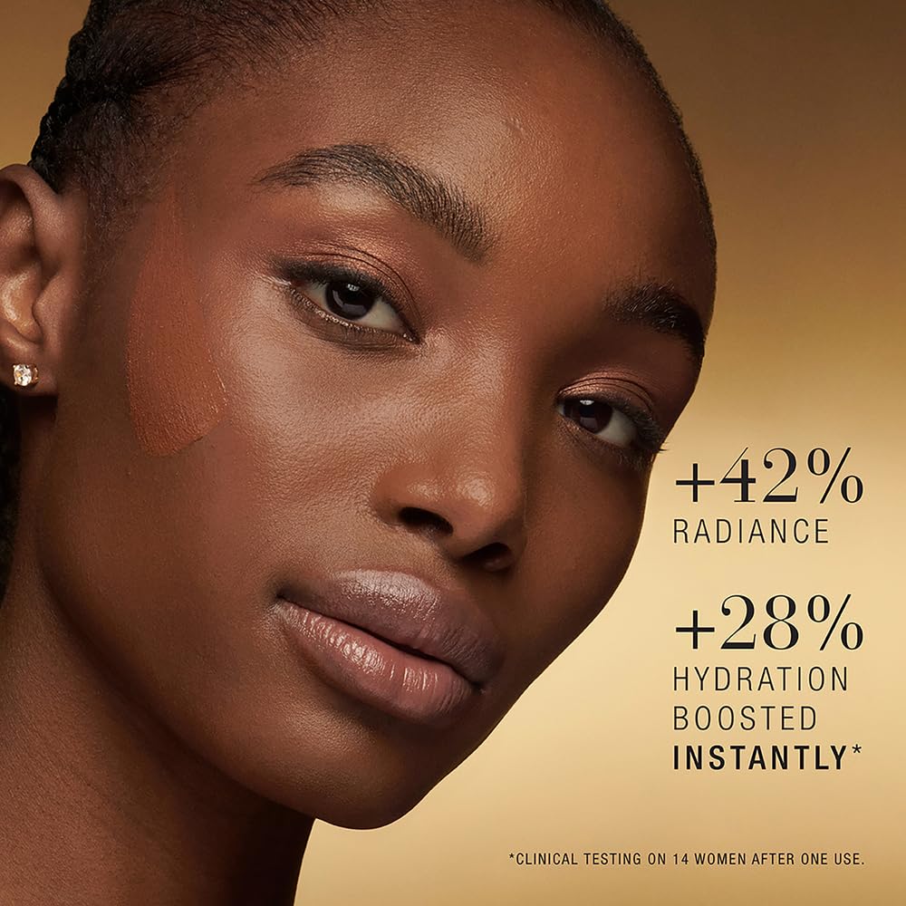 Estée Lauder close-up of silk-like foundation texture showing hydration and smooth blending benefit