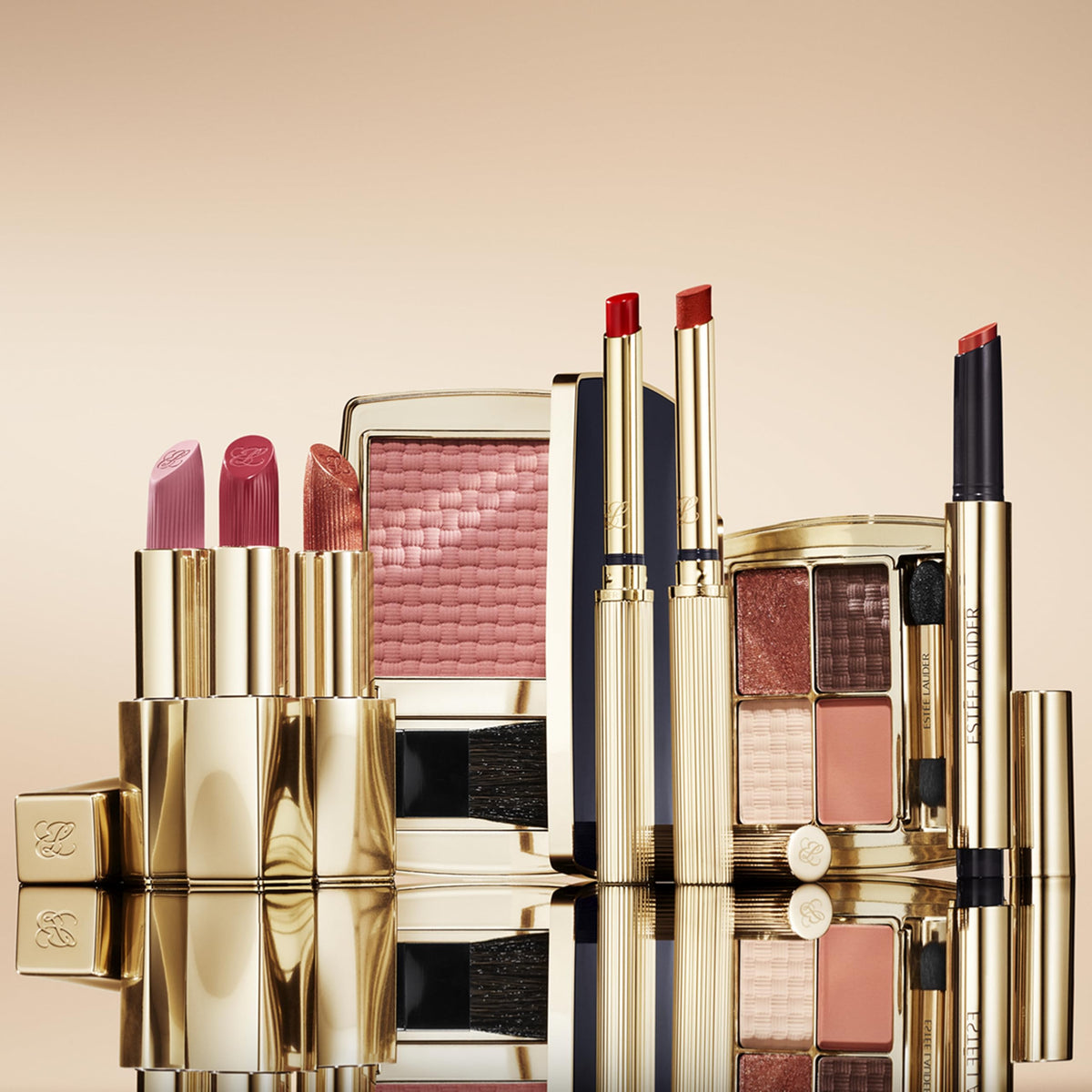 Estée Lauder model applying blush with brush, illustrating natural sculpting effect
