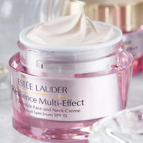 Estée Lauder applying moisturizer to neck, shows firming and smoothing results
