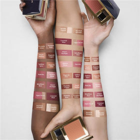 Estée Lauder swatches on arm showing buildable Rebellious Rose color payoff and longevity