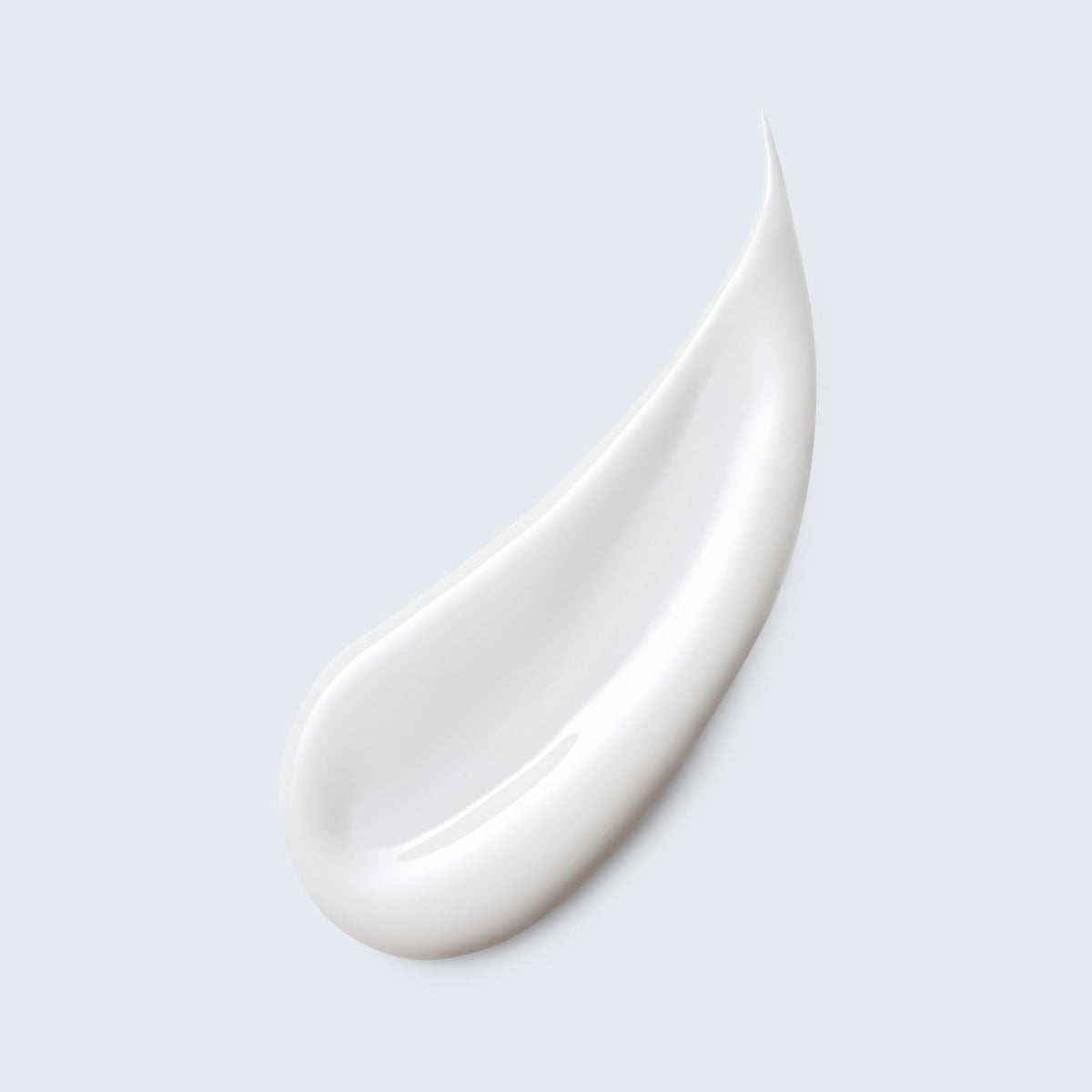 Estée Lauder milky fluid texture close-up demonstrating smooth glide