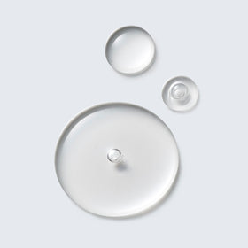 Estée Lauder texture on cotton pad showing lightweight liquid and easy application benefit