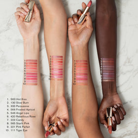 Estée Lauder applied on lips in lifestyle scene demonstrating flattering, long-wear finish