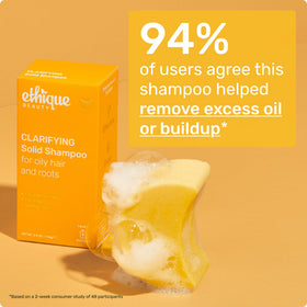 Ethique shampoo and conditioner bars in a shower setting demonstrating travel-friendly convenience