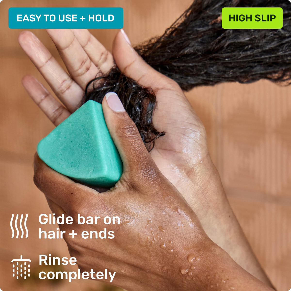 Ethique conditioner applied to wet curls showing frizz control benefit