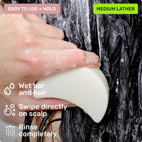 Ethique bar displayed on bathroom shelf conveying plastic-free routine