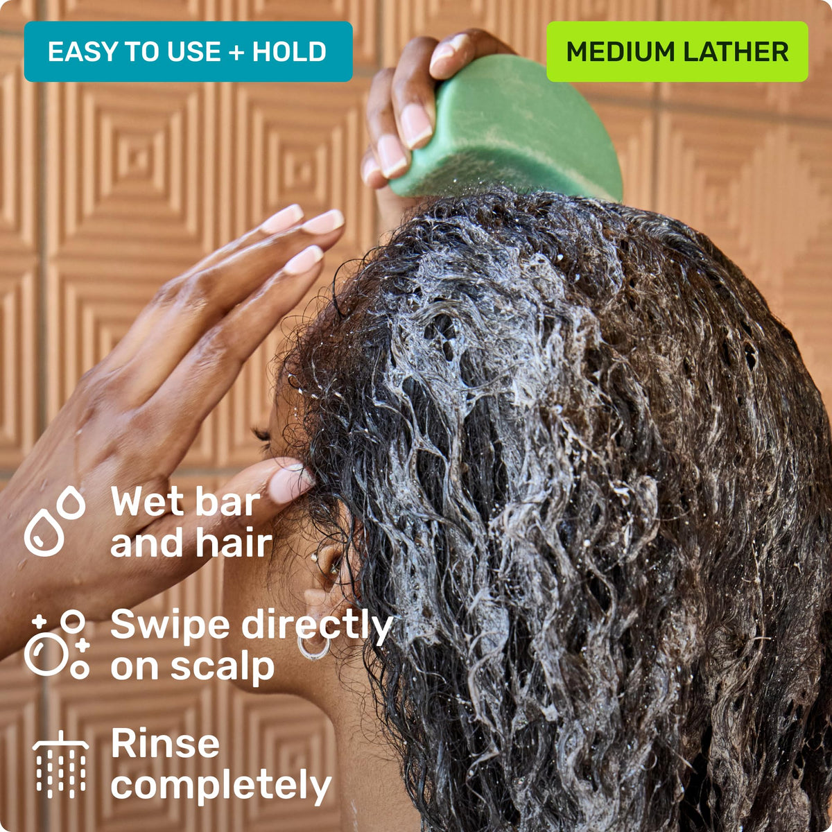 Ethique wet curled hair after use showing defined, frizz-reduced curls