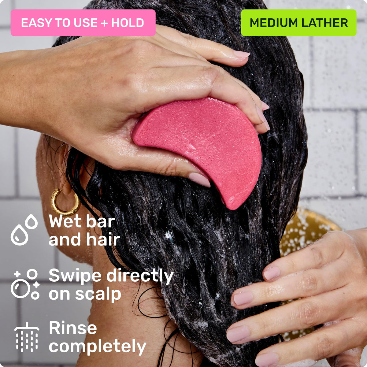 Ethique bars in palm for scale to show compact, travel‑friendly size