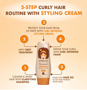 ETNIKER cream in hands being warmed for even distribution and better curl definition