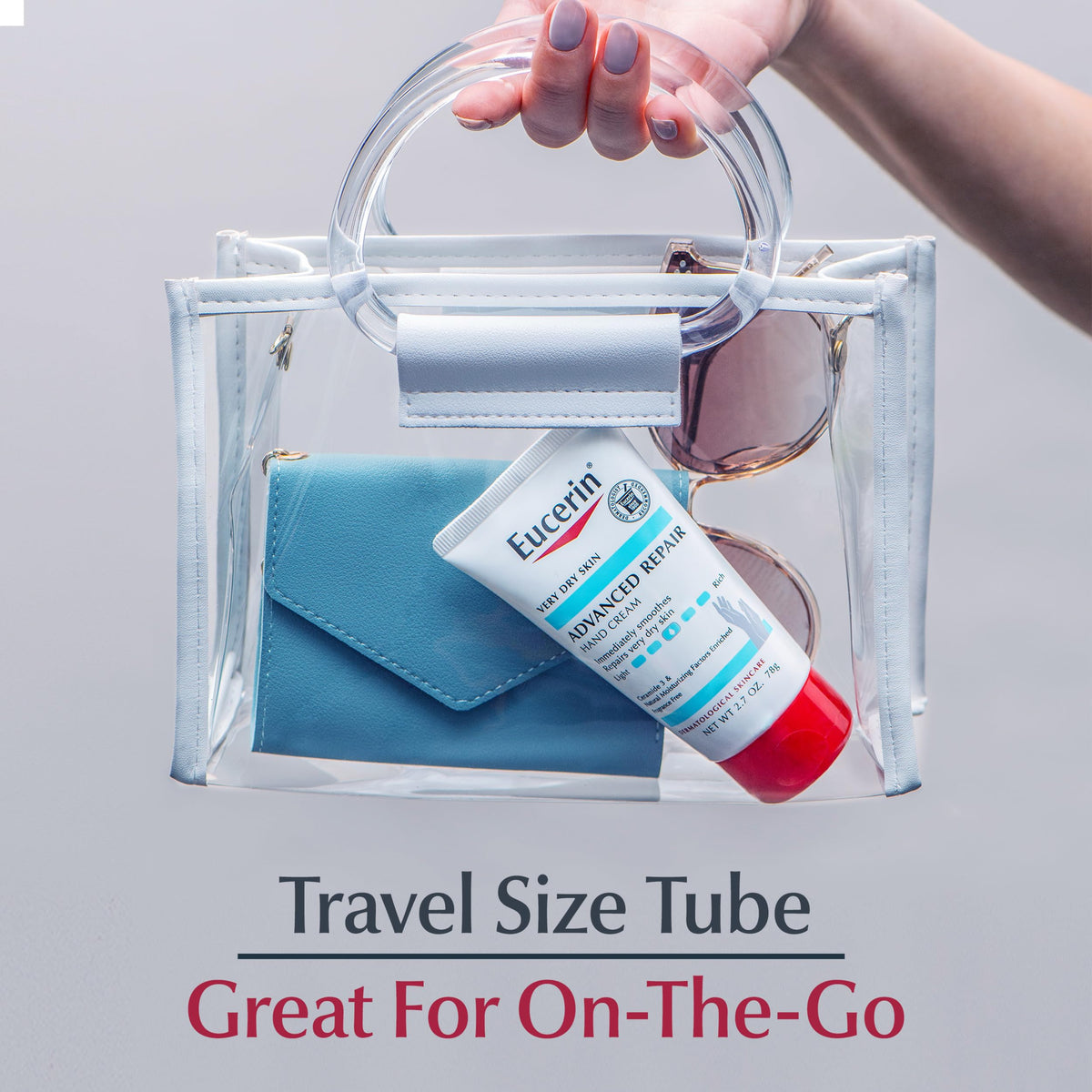 Lifestyle winter scene with Eucerin hand cream protecting dry hands outdoors