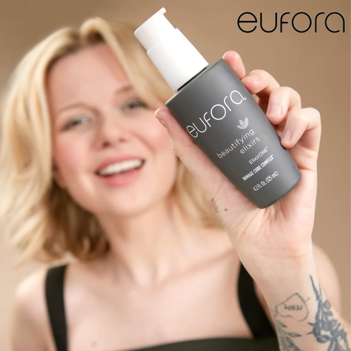 Eufora ElixirONE serum texture on hair strand showing smooth finish and lightweight shine