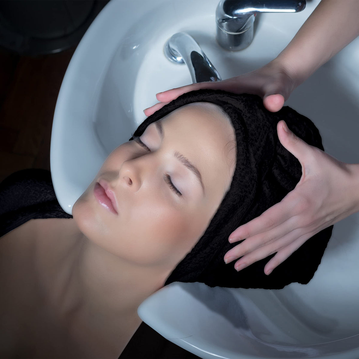 Eurow towel wrapped on client in salon illustrating quick moisture removal and styling speed