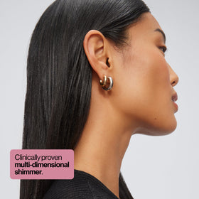 Eva NYC glitter spray in use on hair demonstrating instant sparkle boost