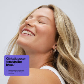 EVA·NYC creamy purple conditioner texture demonstrating rich moisture