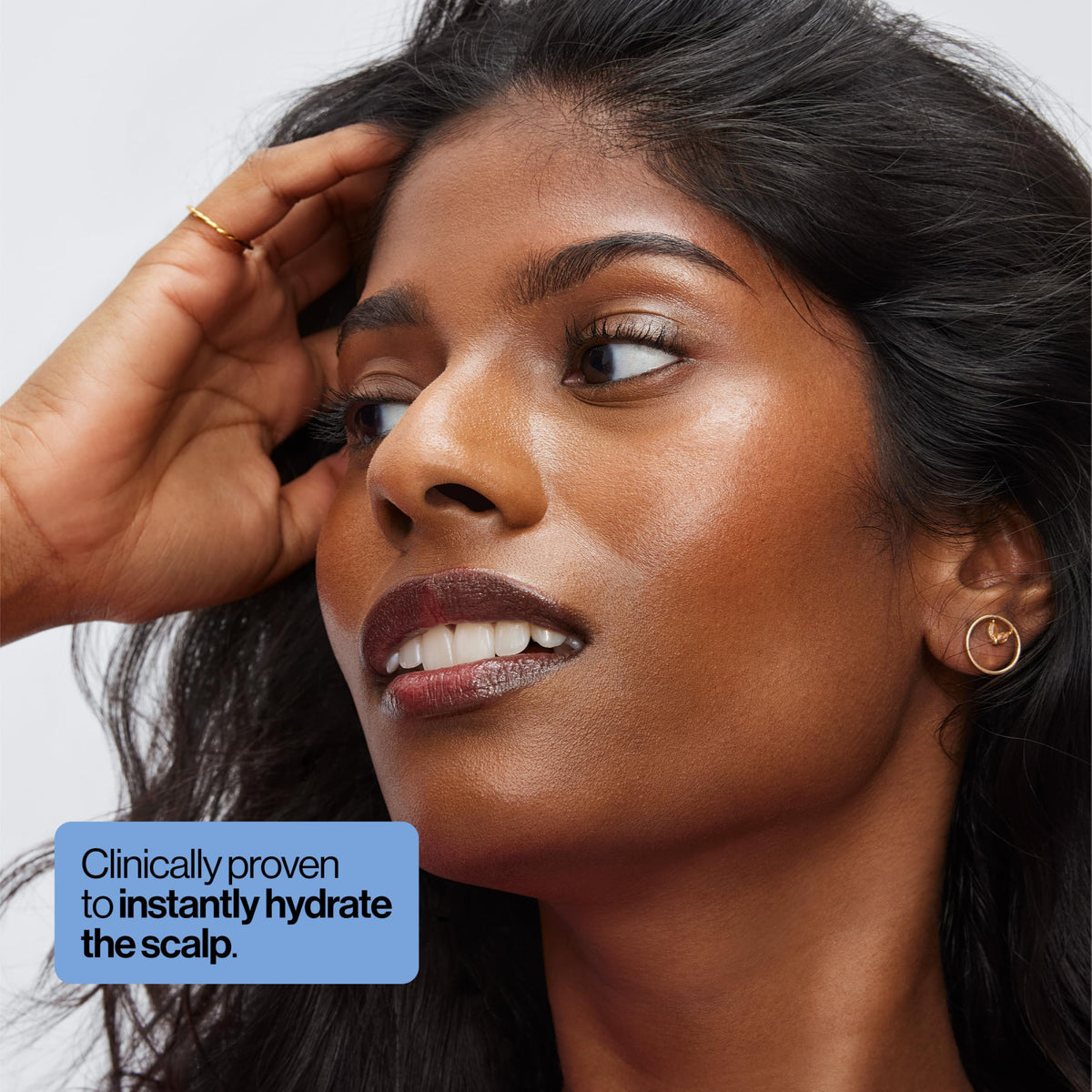 EVA·NYC dropper detail dispensing serum, demonstrates precise application