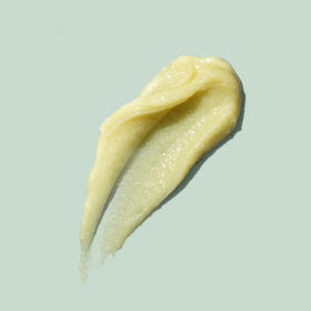 EVE LOM balm removed with cloth action showing gentle wipe-off and exfoliation benefit