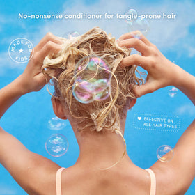 Evereden conditioner texture pouring to illustrate slip benefit