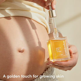 Pregnant person applying Evereden to belly for hydration and comfort