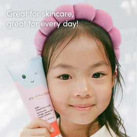 Evereden headband worn by child washing face keeping hair dry and eyes clear