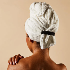 Everist towel beside gym bag showing travel-ready lightweight convenience
