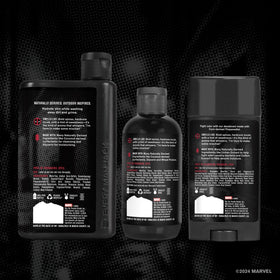 Every Man Jack bottles held in hand showing size and travel-friendly convenience