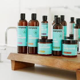 everyone for every body jar on bathroom shelf in lifestyle setting suggesting easy routine