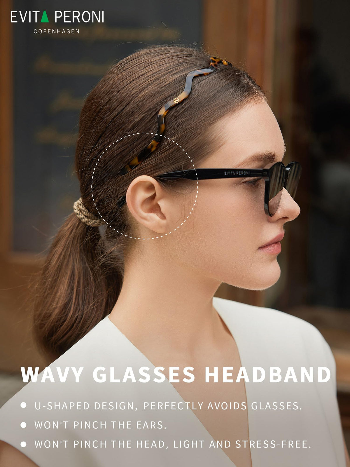 EVITA PERONI acetate texture detail highlighting resilient glossy material and durability