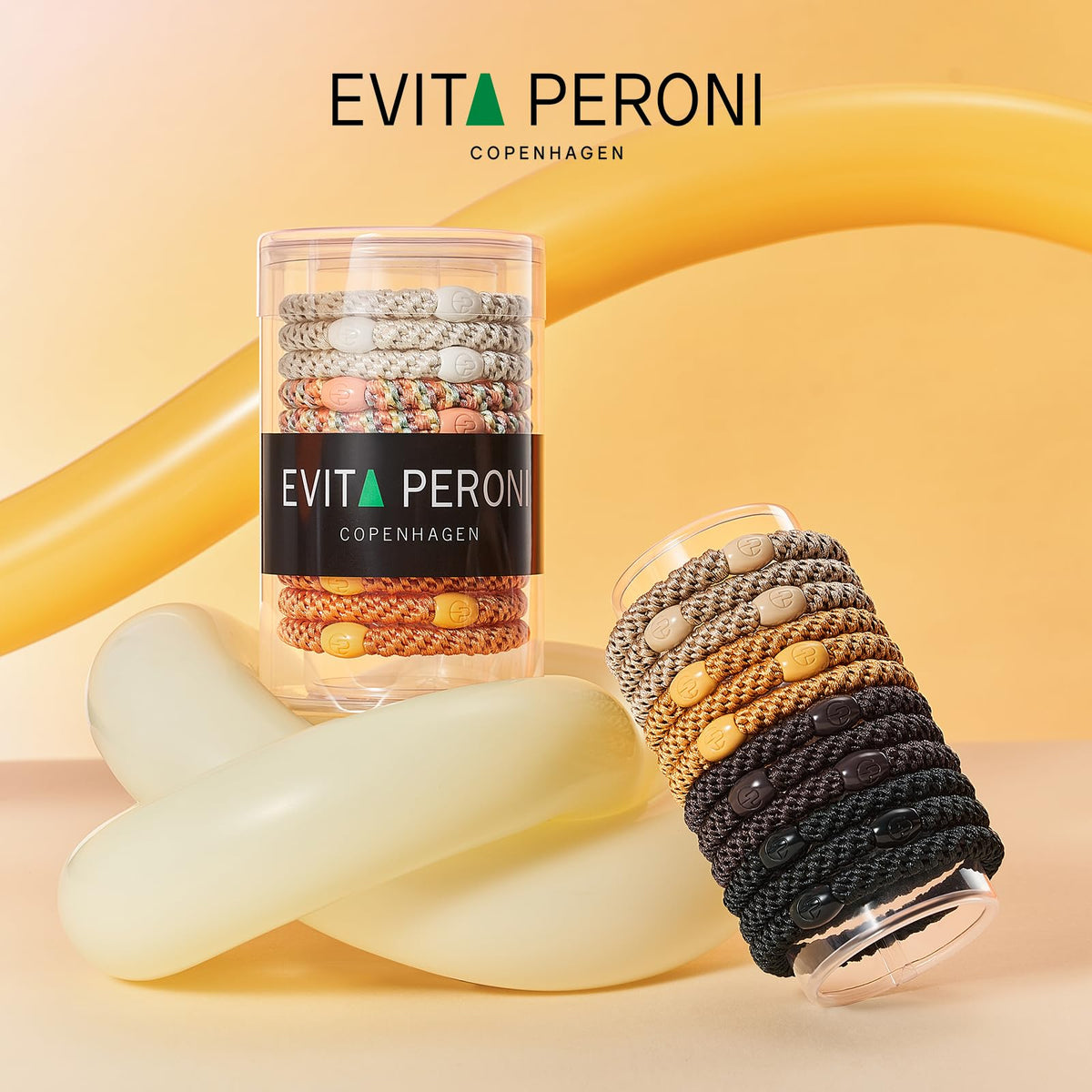 EVITA PERONI brown with gold detailing highlighting warm, elegant tone