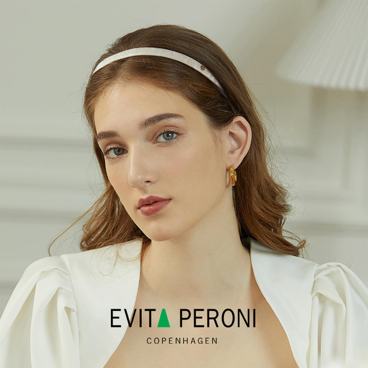 EVITA PERONI close-up of acetate texture highlighting glossy, elastic finish