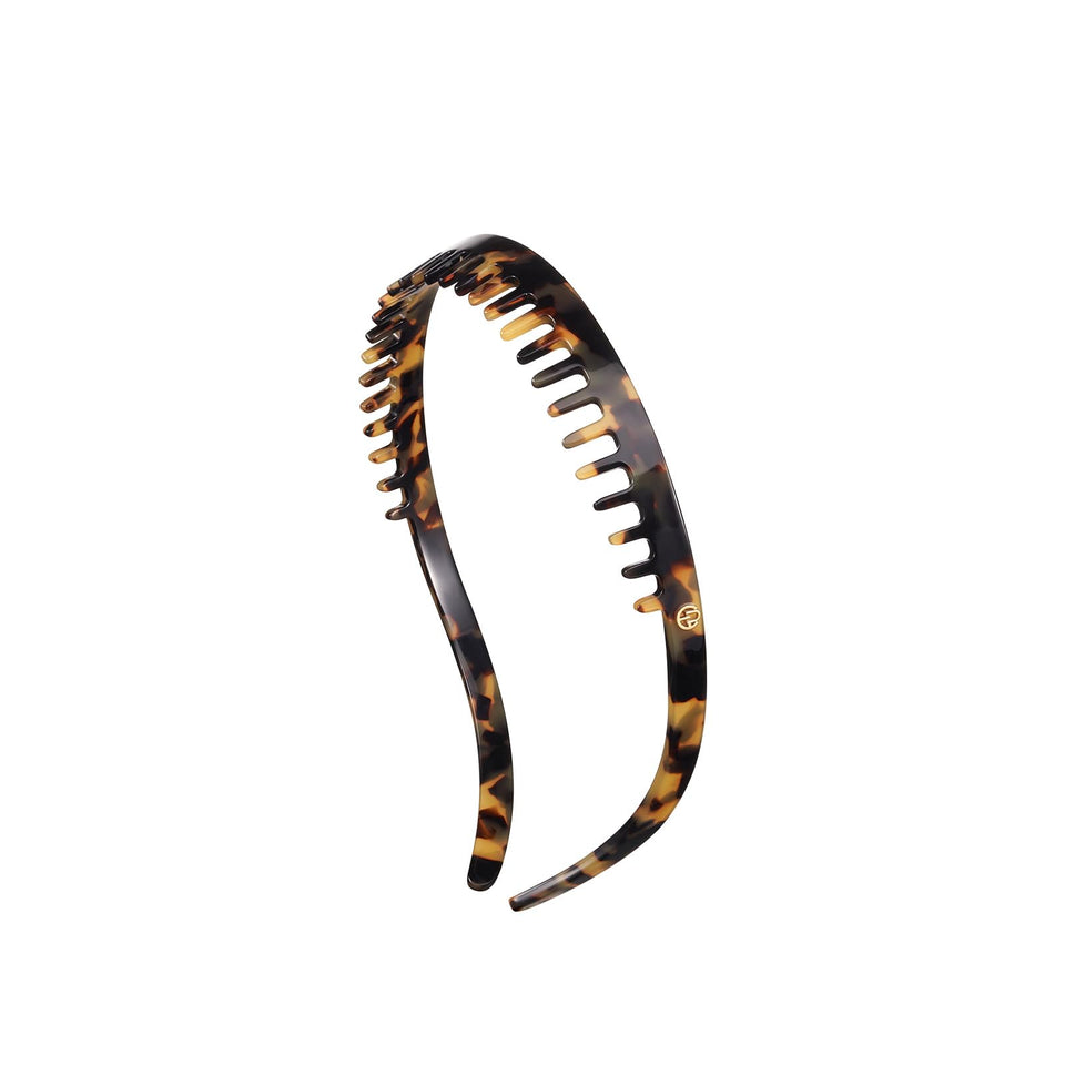 EVITA PERONI front packaging shows tortoiseshell headband as elegant gift