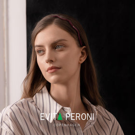 EVITA PERONI headband worn with glasses demonstrating comfortable fit